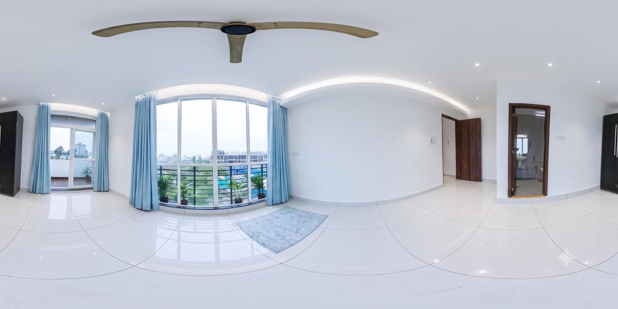 360 degree view of a bedroom opening onto a balcony with a city view